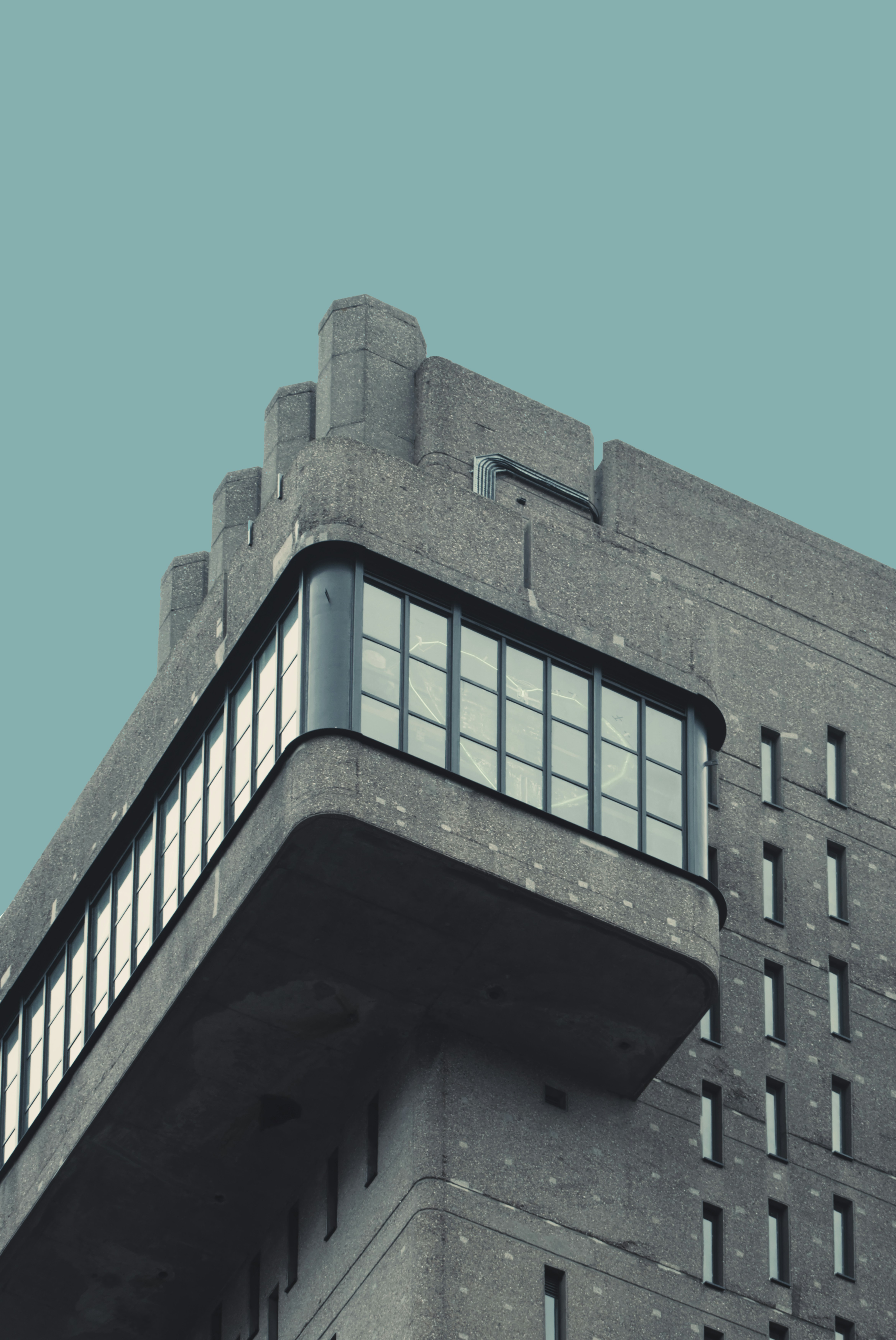 a very tall building with a clock on the top of it