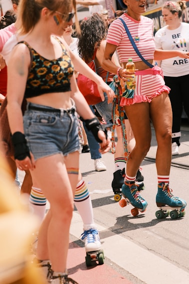 A lively group of skaters of all ages enjoying a sunny day at the Hasharon roller rink.