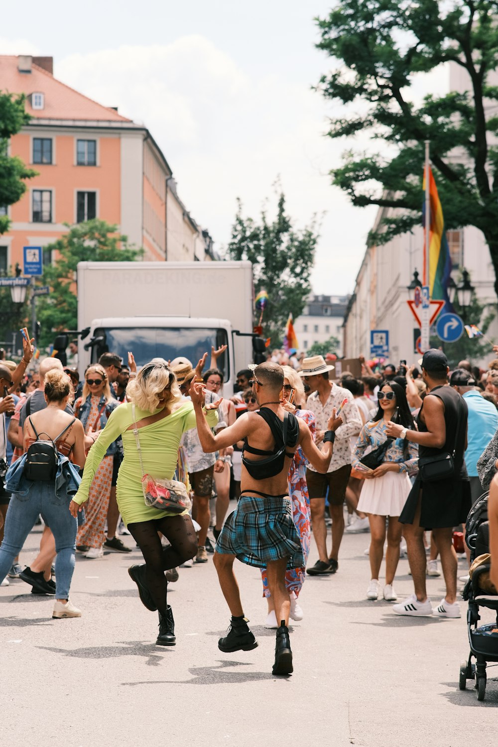 a group of people dancing in the street