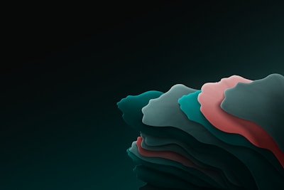 A series of layered silhouettes resembling human profiles are displayed in a smooth gradient. The profiles are in different shades of teal, green, and coral, creating an artistic and abstract effect against a dark background.