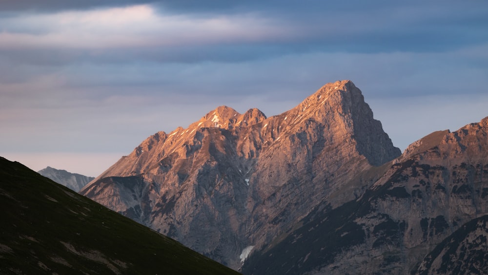 a view of a mountain range at sunset