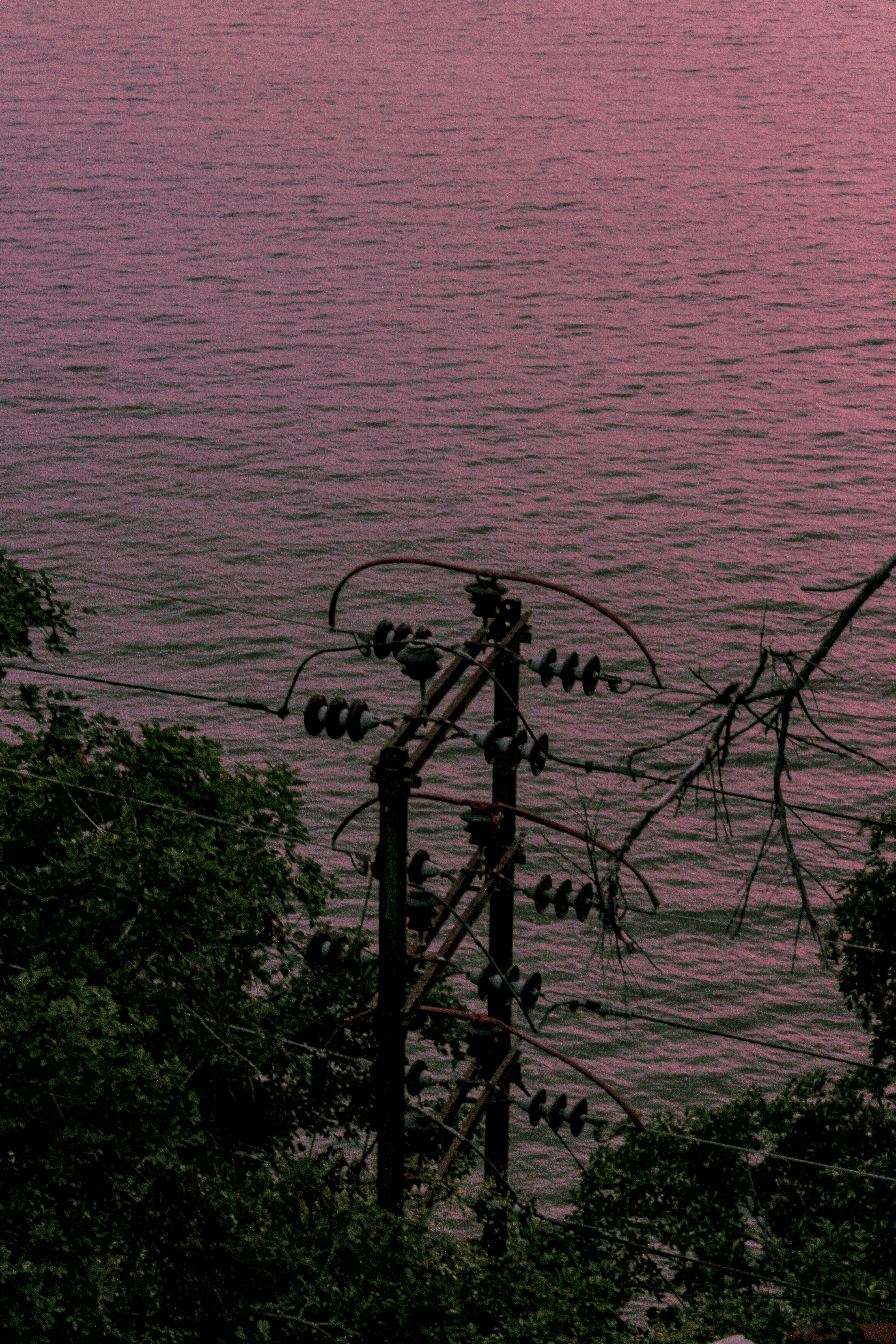 a view of a body of water at sunset