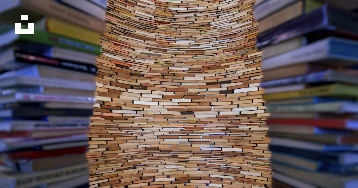 A stack of books stacked on top of each other photo – Free Pattern ...