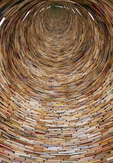 a very large circular object made out of books