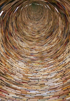 a very large circular object made out of books
