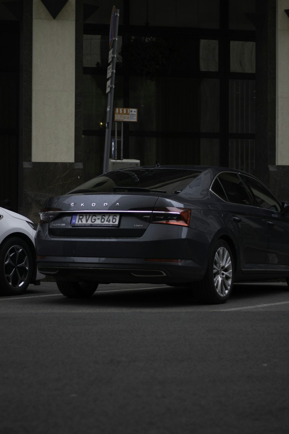 a couple of cars parked next to each other