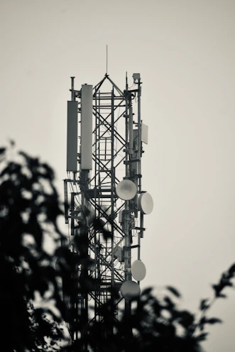 a very tall tower with lots of lights on top of it