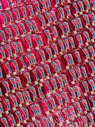 Colorful packages of food products arranged by price categories on a simple background