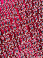 Stacks of neatly packed snack boxes ready to be delivered, highlighting the freshness and care in packaging.