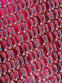 Close-up of colorful snack boxes with green and orange details, reflecting the brand’s playful style.