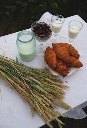 Fresh dairy products displayed on a rustic wooden table