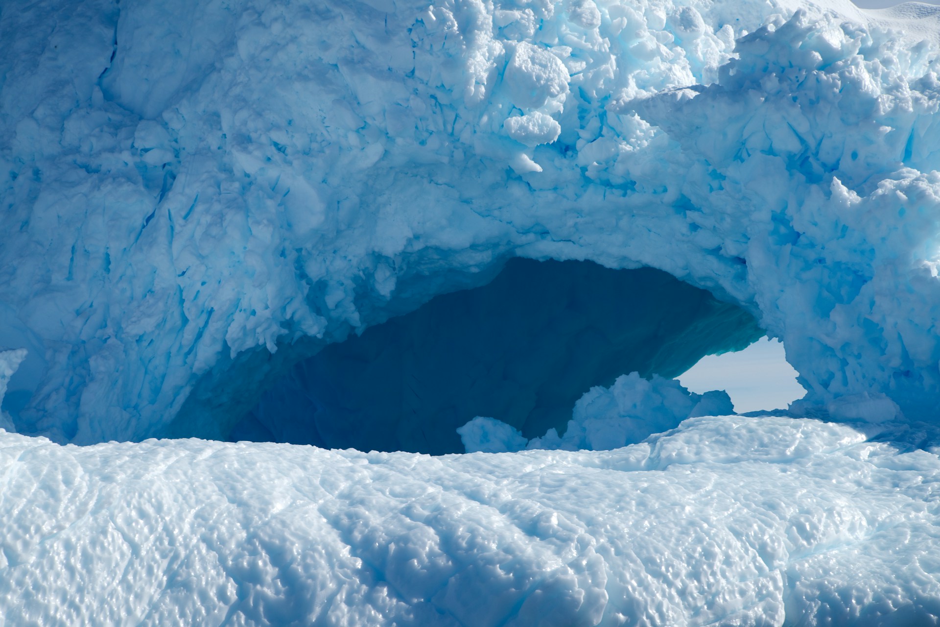 a large ice cave in the middle of the ocean
