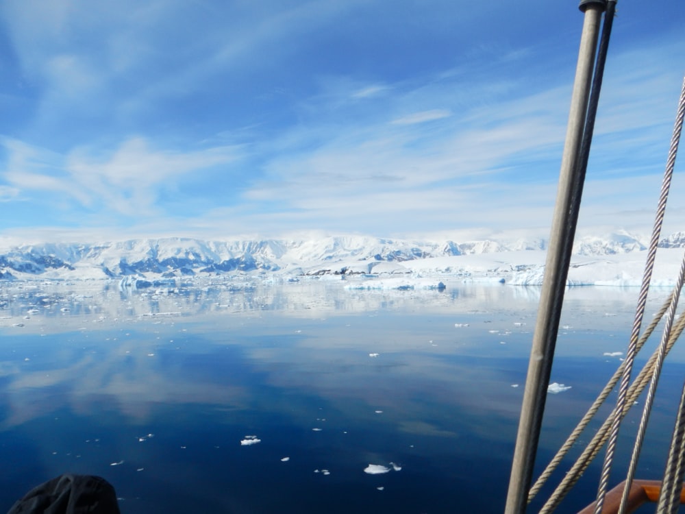 the view from a boat of icebergs in the water