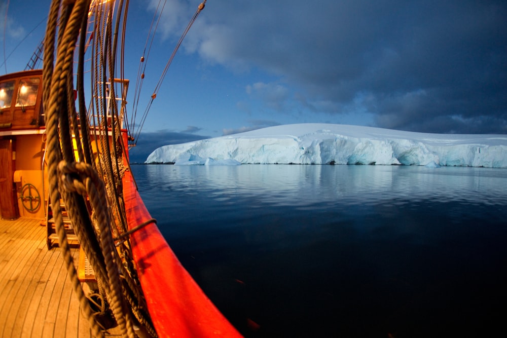 a large iceberg in the middle of a body of water