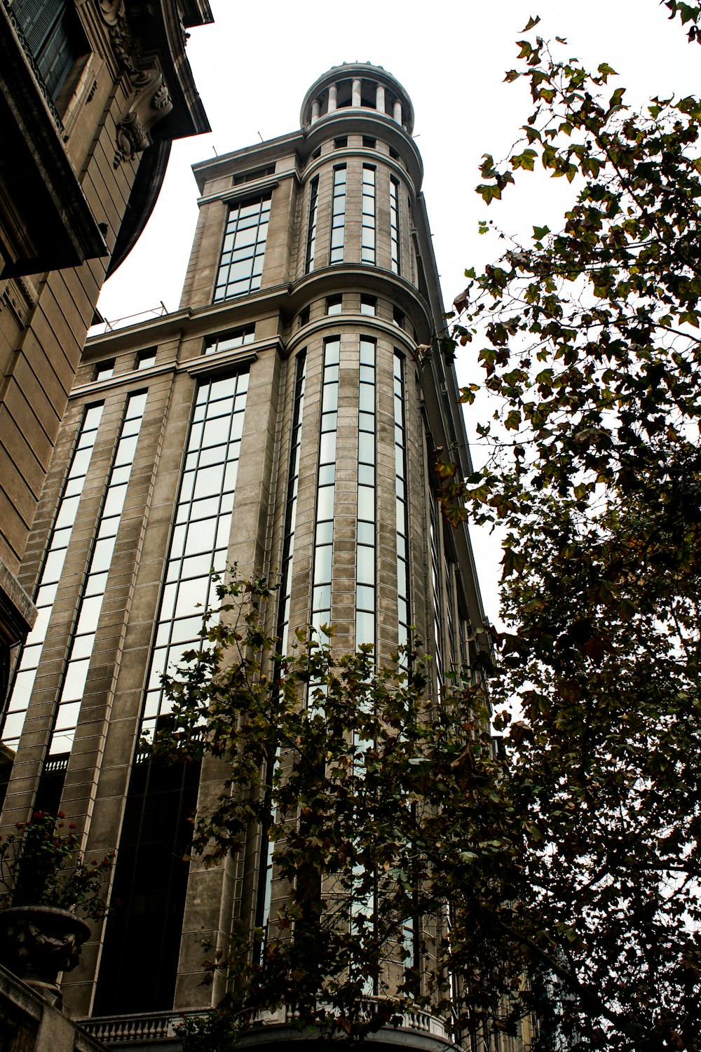 a tall building with a clock on the front of it