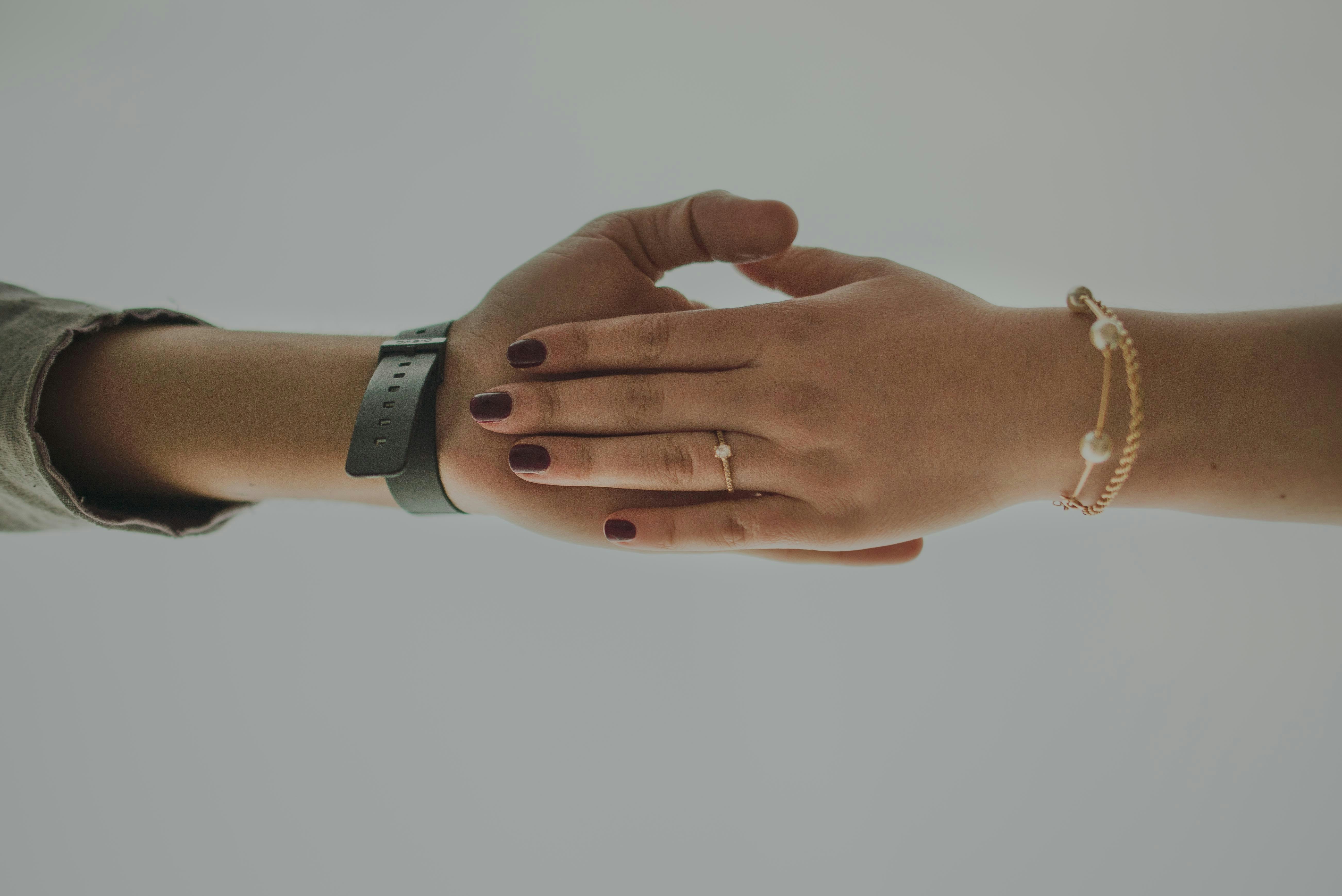 a couple of people that are holding hands