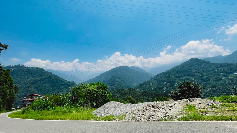 a winding road in the middle of a mountain range