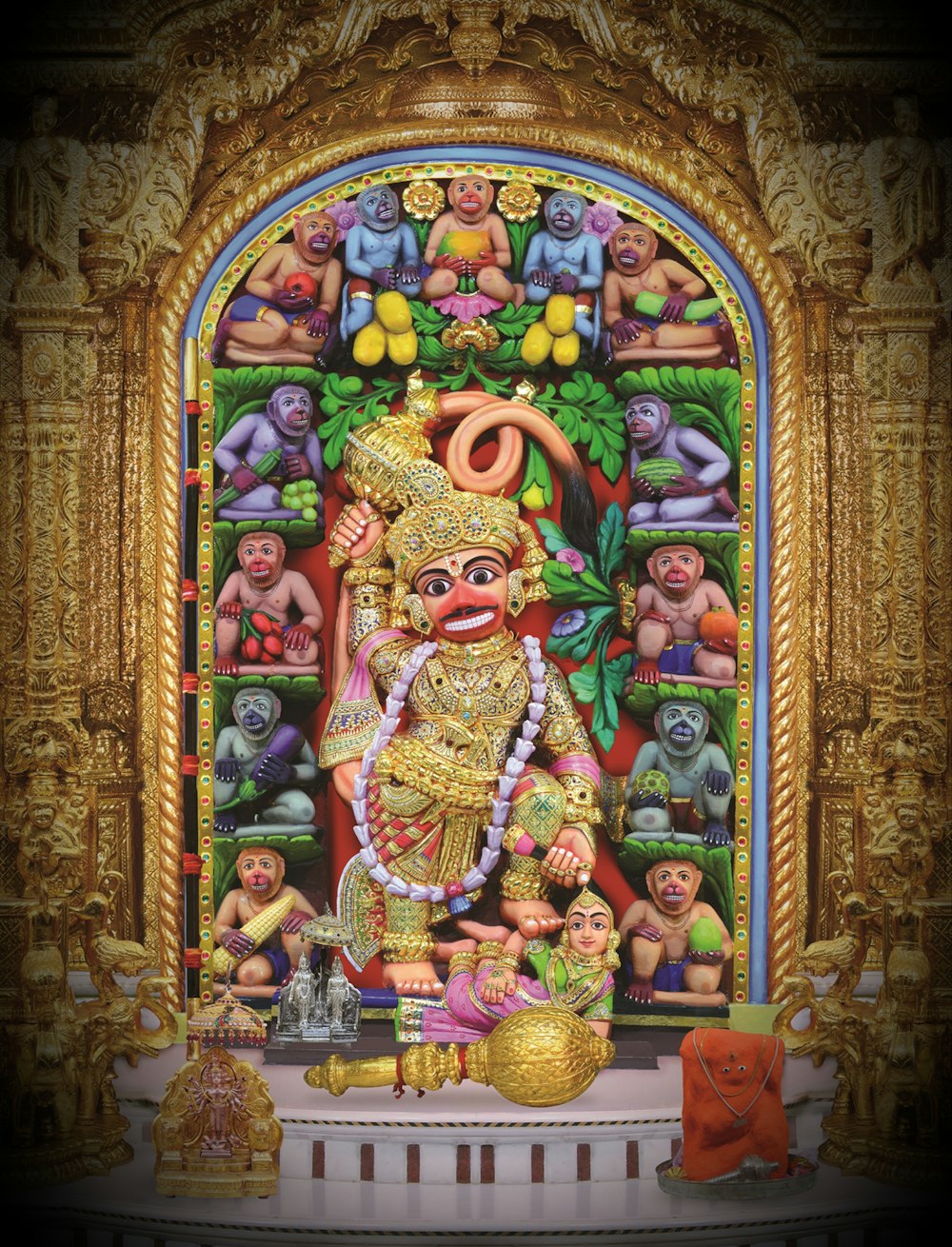 a painting of a hindu god surrounded by monkeys