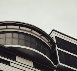 Finished modern building showcasing sleek chrome and glass elements.