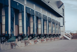 a building that has a bunch of windows on the side of it