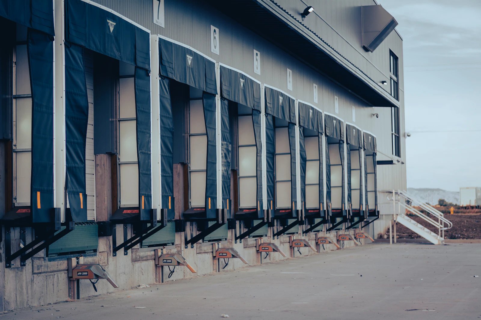 A large building facade with a regular grid of windows