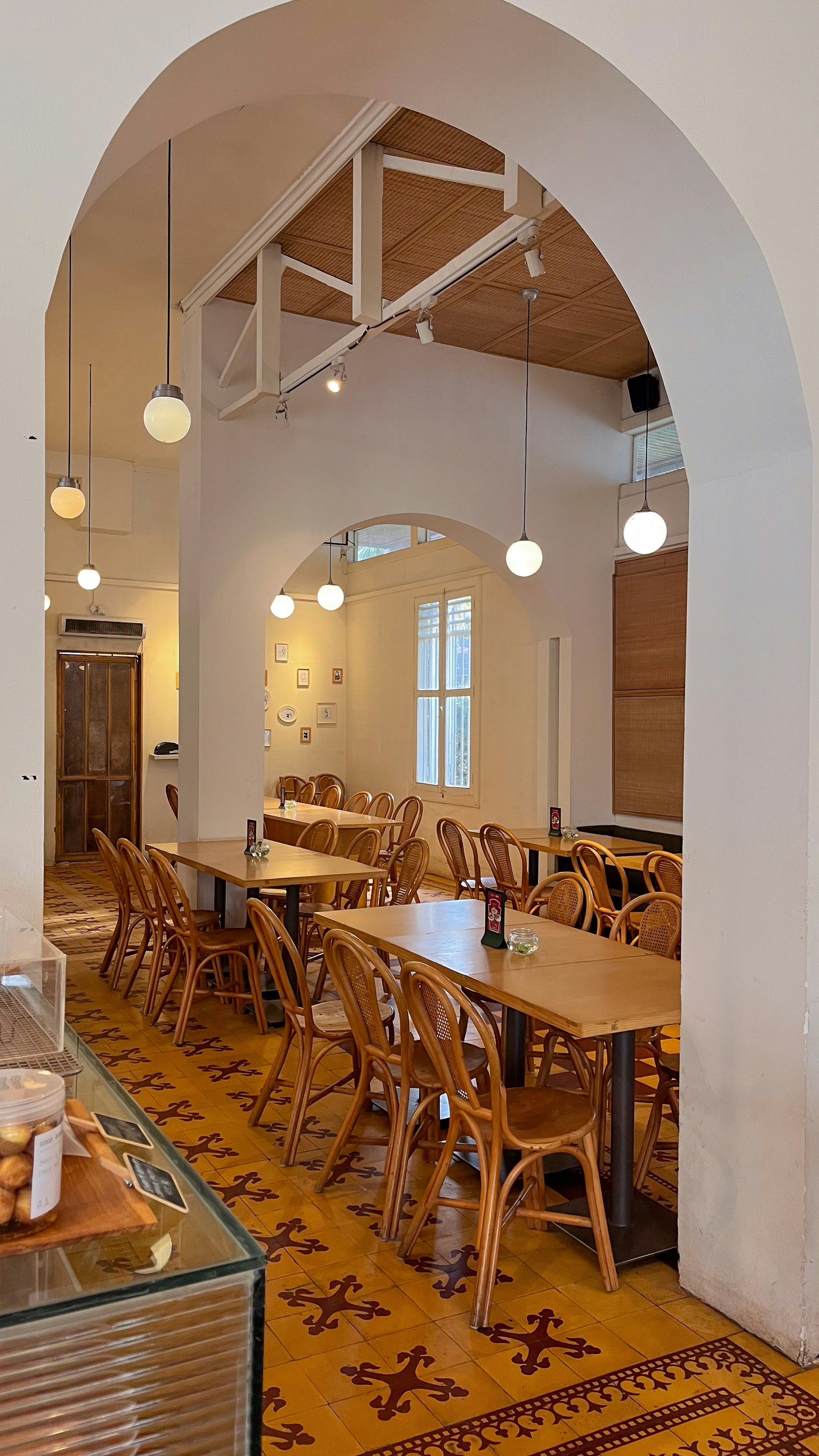 woman wearing yellow long-sleeved dress under white clouds and blue sky during daytime