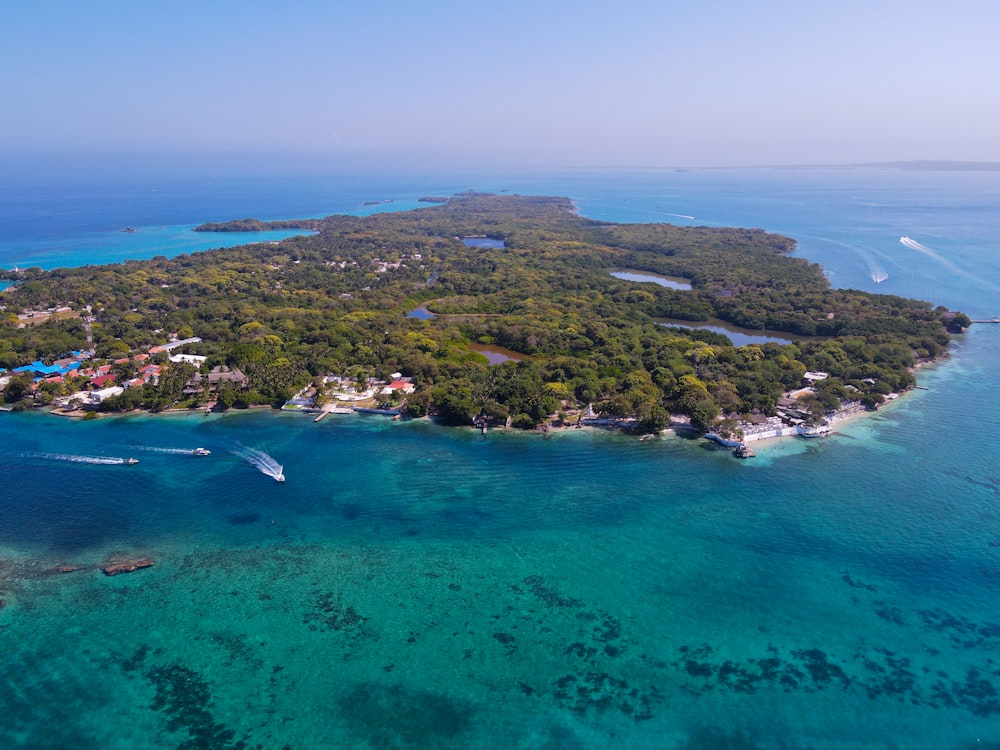 an aerial view of a small island in the middle of the ocean