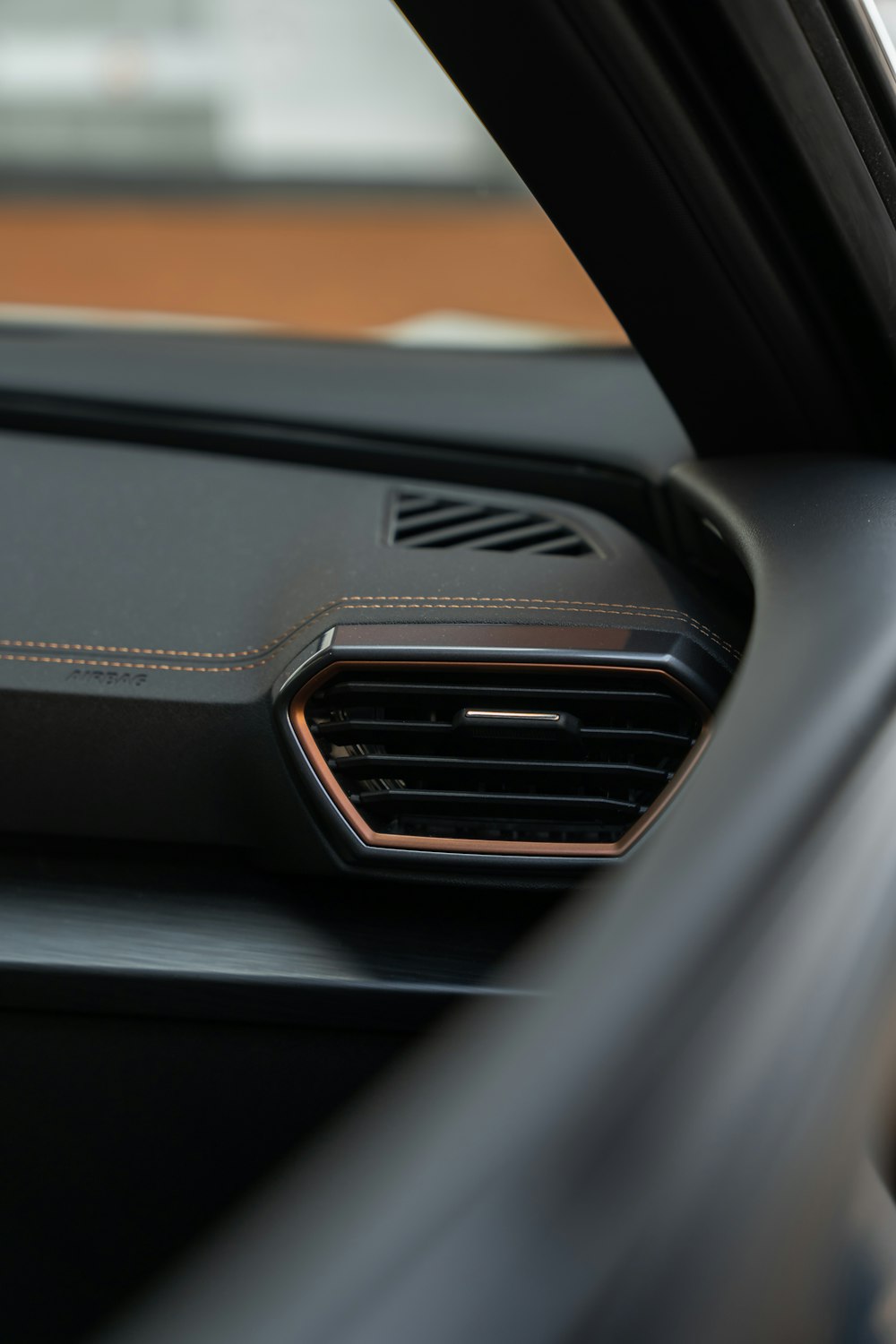 a close up of the air vent in a car