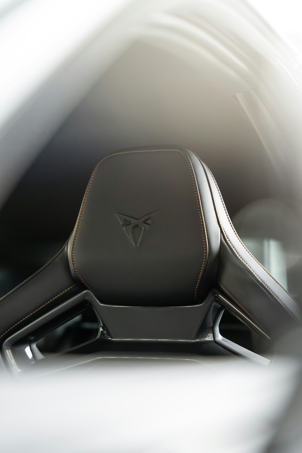 a close up of a steering wheel in a car