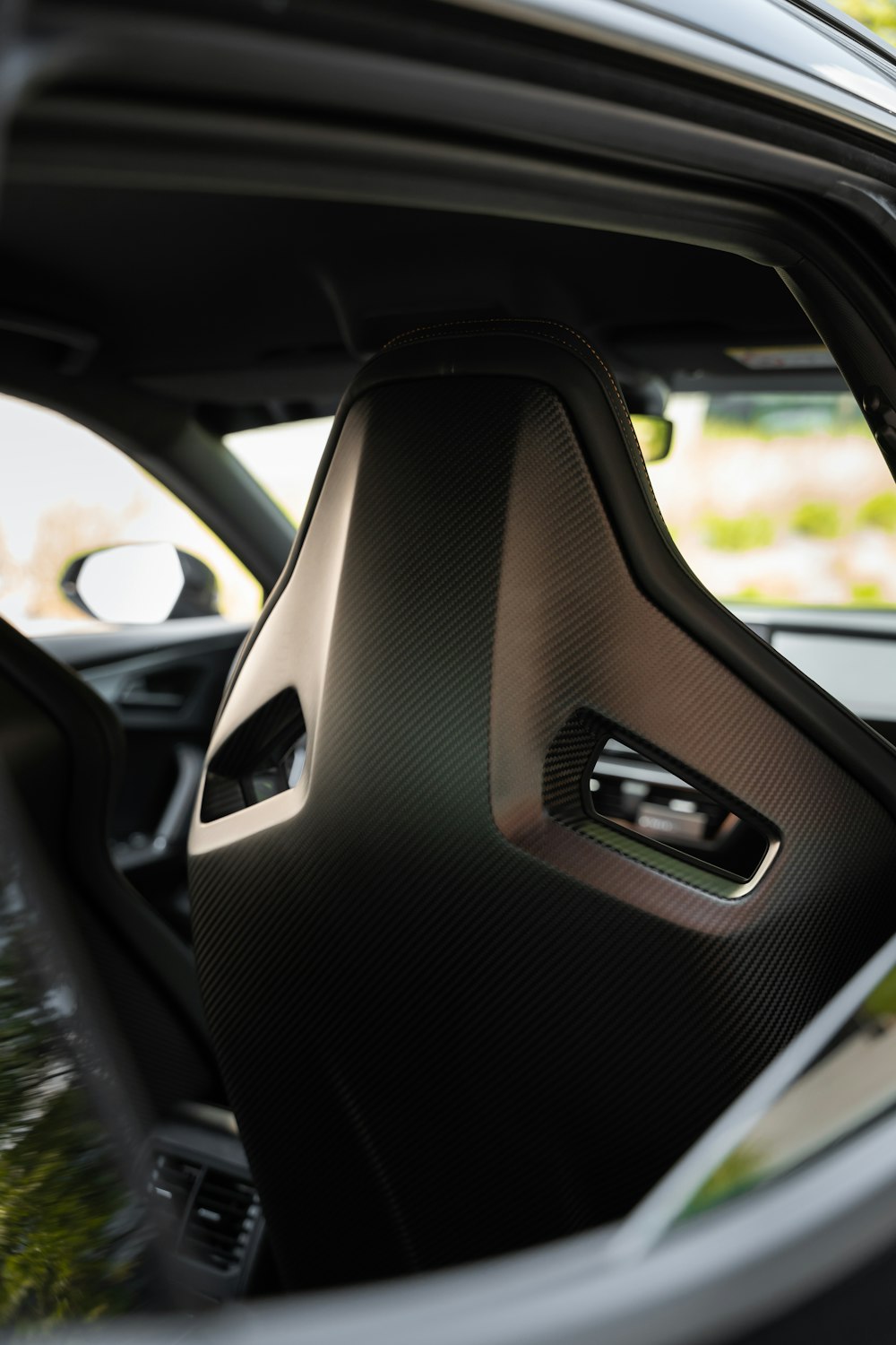 the inside of a car with the door open