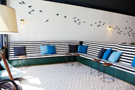 a room that has a bunch of couches in it