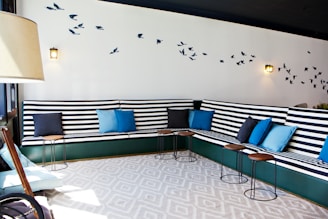 a room that has a bunch of couches in it