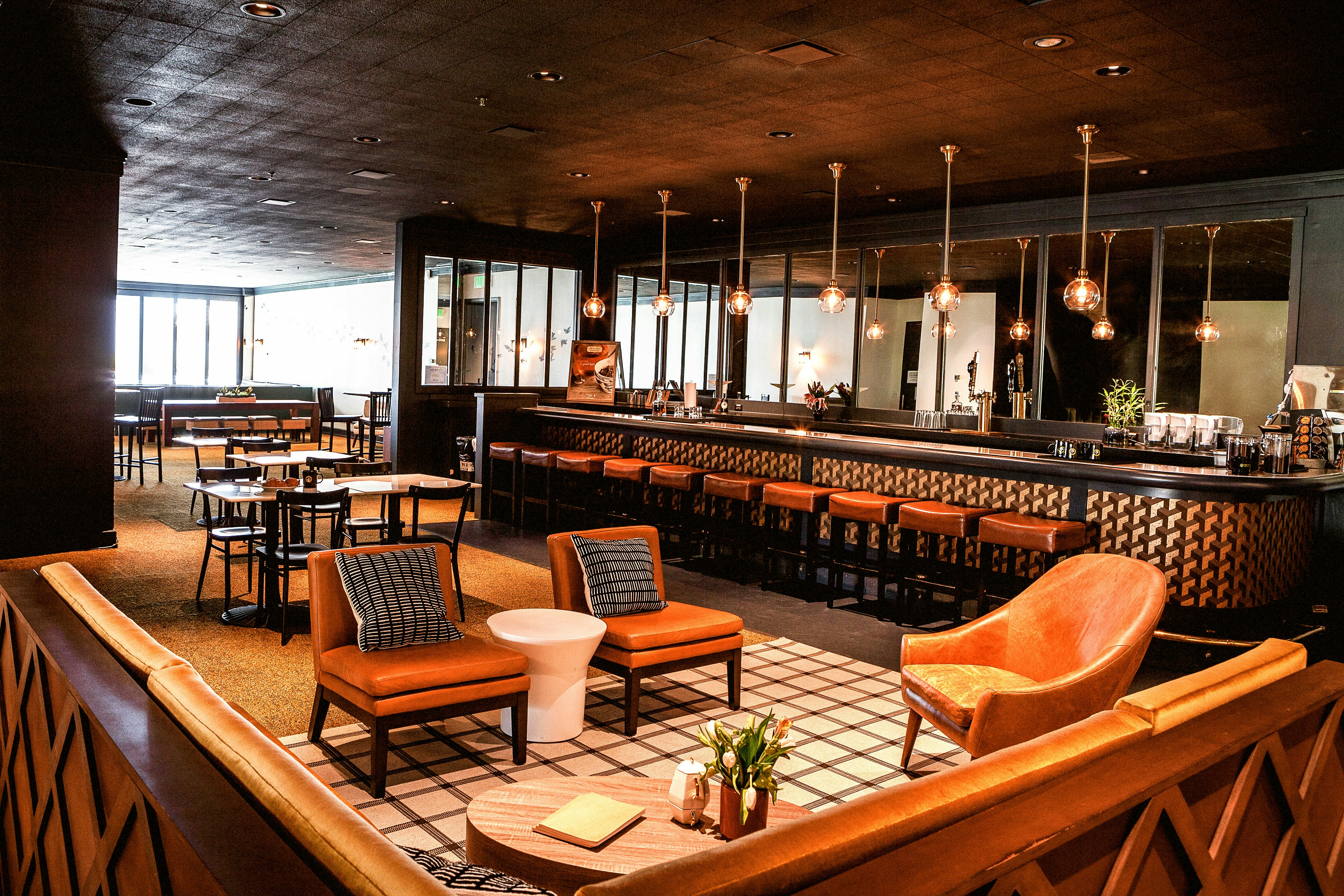 A captivating scene unfolds in a luxurious restaurant, bathed in soft golden light.