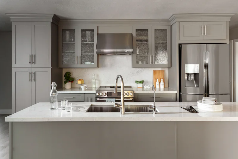 Kitchen with a sink, refrigerator, stove, and dishwasher