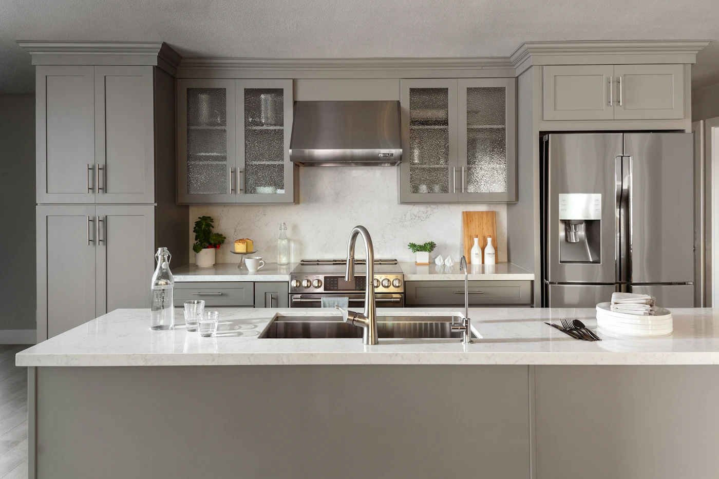 Modern kitchen with a refrigerator, stove, and dishwasher