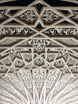 Artistic pattern of letters and symbols arranged in a harmonious, luxurious style.