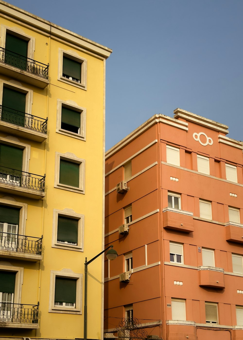 a couple of tall buildings next to each other