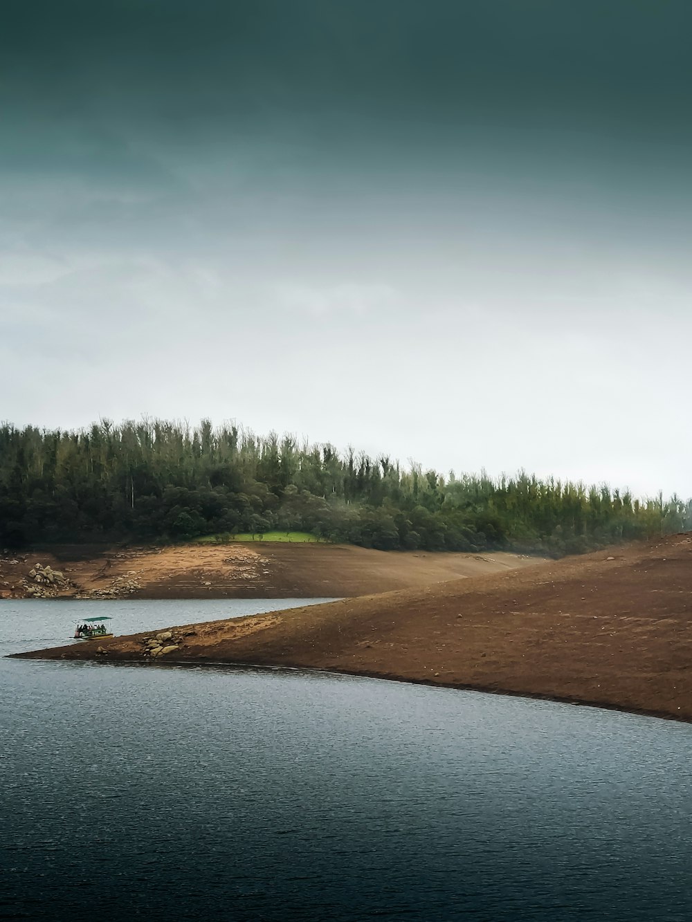 a small boat on a body of water