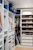 Close-up of a customizable wardrobe interior featuring neatly organized shelves and drawers.