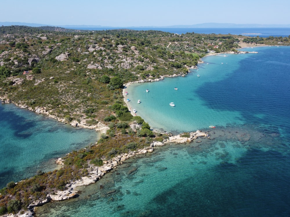 an aerial view of a small island in the middle of the ocean