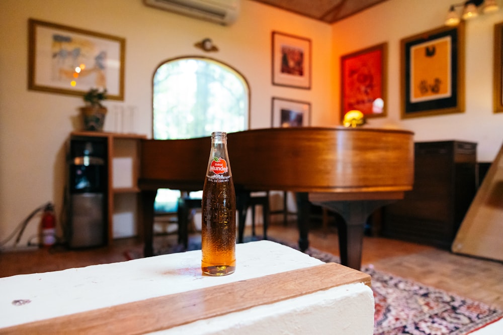 a bottle of beer sitting on top of a table
