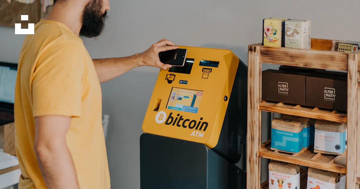A man putting a bitcoin machine into a bin photo – Free Prague Image on ...