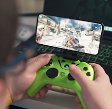 a person playing a video game on a laptop