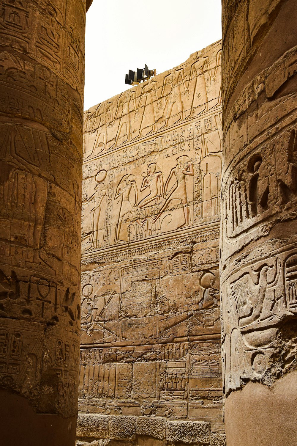 a couple of large stone pillars sitting next to each other