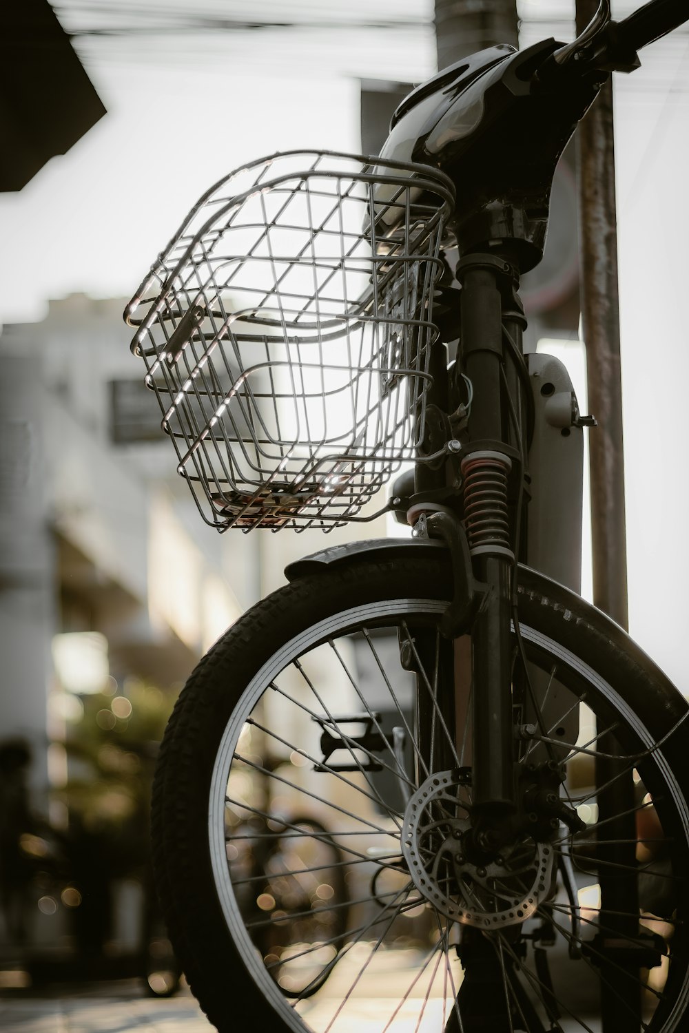 a bicycle with a basket attached to it