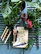 A smiling gardener arranging vibrant plants with Havenly’s premium garden tools.
