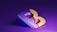 A stylized 3D graphic of a letter 'B' featuring a blend of bold, vibrant colors including purple, yellow, and pink. The letter is set against a monochromatic purple background, giving it a floating, futuristic appearance with shadows and depth.