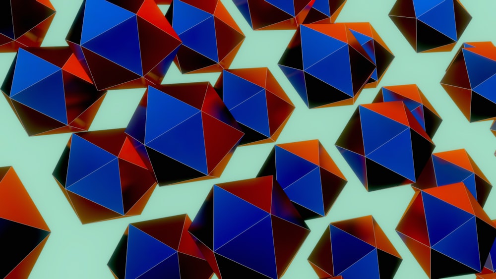 a group of red and blue cubes on a green background