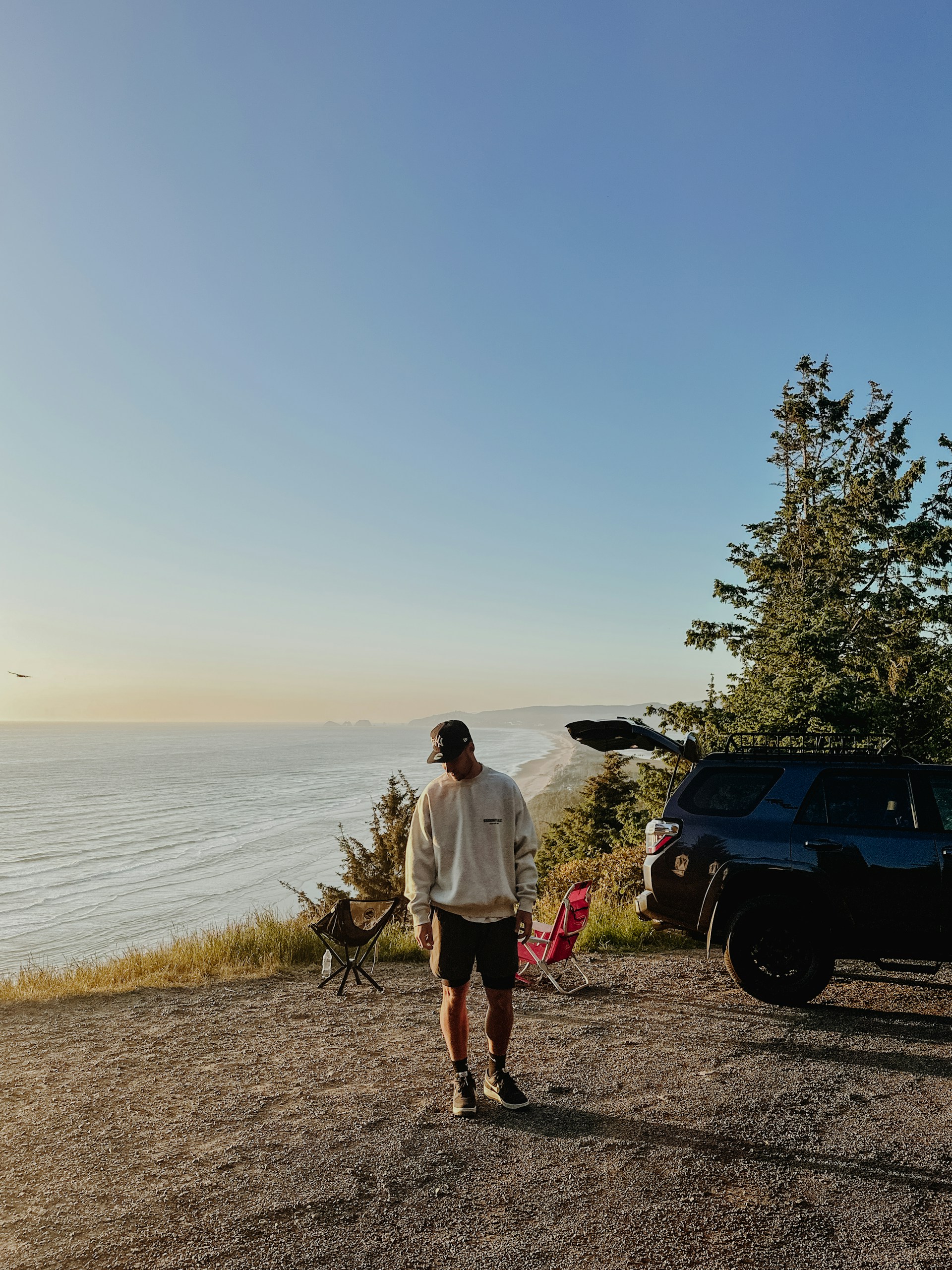 woman wearing yellow long-sleeved dress under white clouds and blue sky during daytime