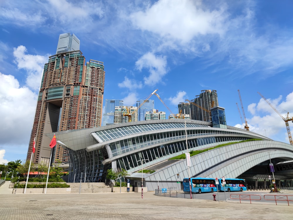 a large building with a very tall tower in the background